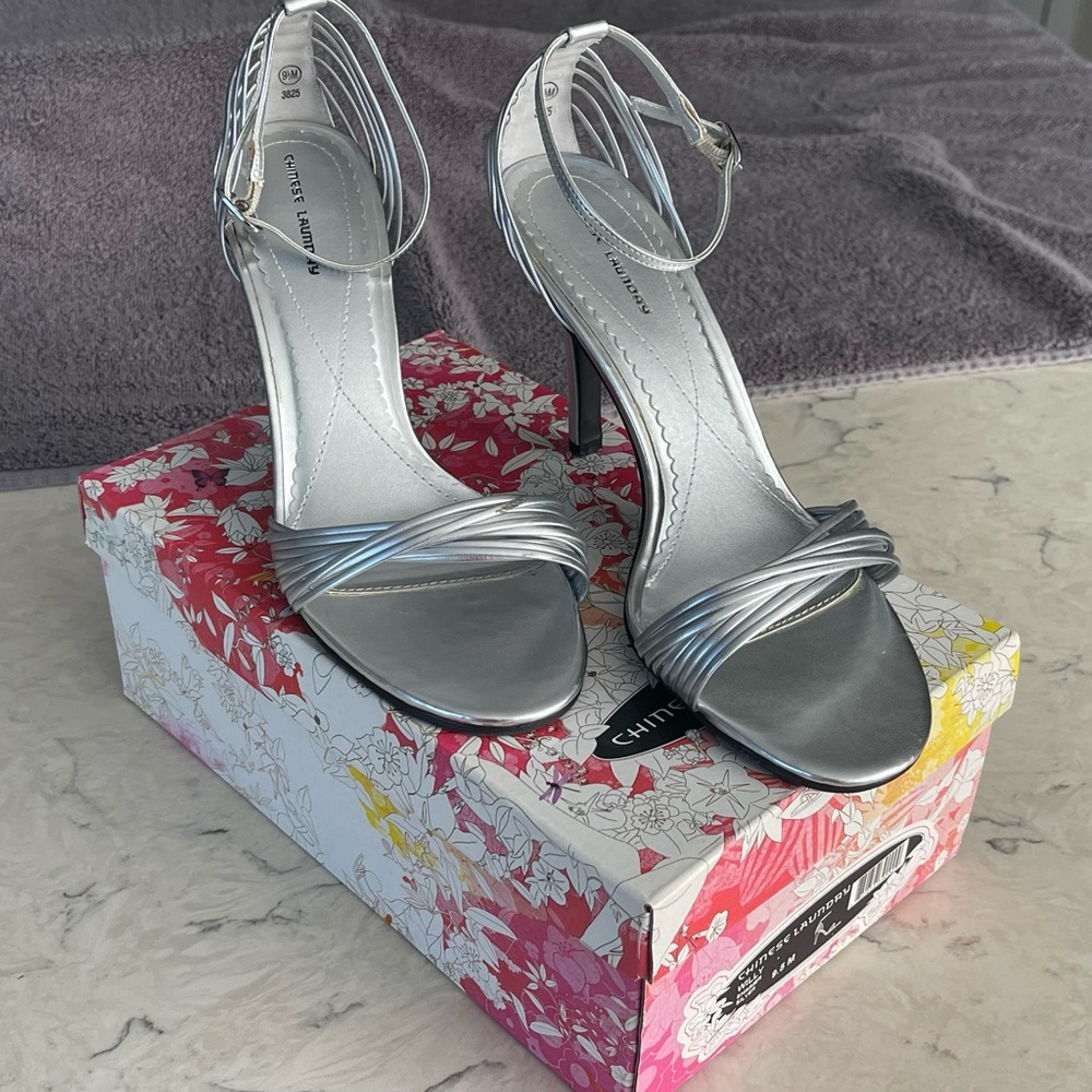 Size 9.5 strapped silver Chinese laundry heel
